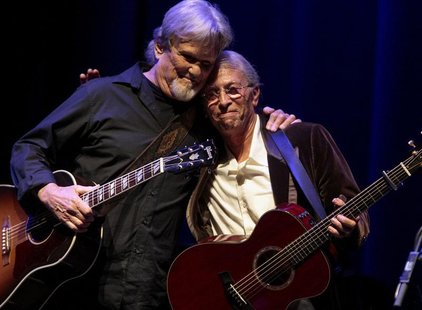 Kris Kristofferson (L) and Joel Rafael embraces each other after performing together during the Woody Guthrie Centennial Celebration Concert Kris Kristofferson (L) and Joel Rafael embraces each other after performing together during the Woody Guthrie Centennial Celebration Concert