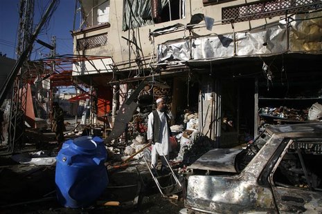 A man stands at the site of a bomb attack in Quetta November 21, 2012. REUTERS/Naseer Ahmed A man stands at the site of a bomb attack in Quetta November 21, 2012. REUTERS/Naseer Ahmed