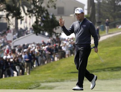 South Africa's Branden Grace reacts after his birdie on the third green during the first round for the 2012 U.S. Open golf championship on t South Africa's Branden Grace reacts after his birdie on the third green during the first round for the 2012 U.S. Open golf championship on t