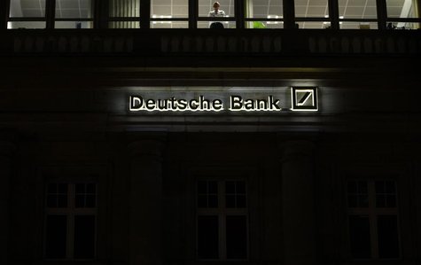 The logo of Germany's largest business bank, Deutsche Bank, is illuminated at the bank's original headquarters in Frankfurt January 31, 2012 The logo of Germany's largest business bank, Deutsche Bank, is illuminated at the bank's original headquarters in Frankfurt January 31, 2012