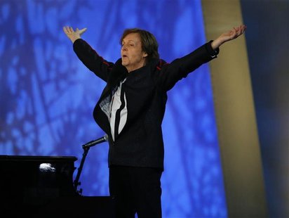 Musician Paul McCartney performs during the opening ceremony of the London 2012 Olympic Games at the Olympic Stadium July 27, 2012. REUTERS/ Musician Paul McCartney performs during the opening ceremony of the London 2012 Olympic Games at the Olympic Stadium July 27, 2012. REUTERS/