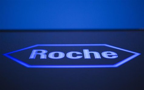 A logo of Swiss pharmaceutical company Roche is pictured in front of a company's building in Rotkreuz, April 12, 2012. REUTERS/Michael Buhol A logo of Swiss pharmaceutical company Roche is pictured in front of a company's building in Rotkreuz, April 12, 2012. REUTERS/Michael Buhol