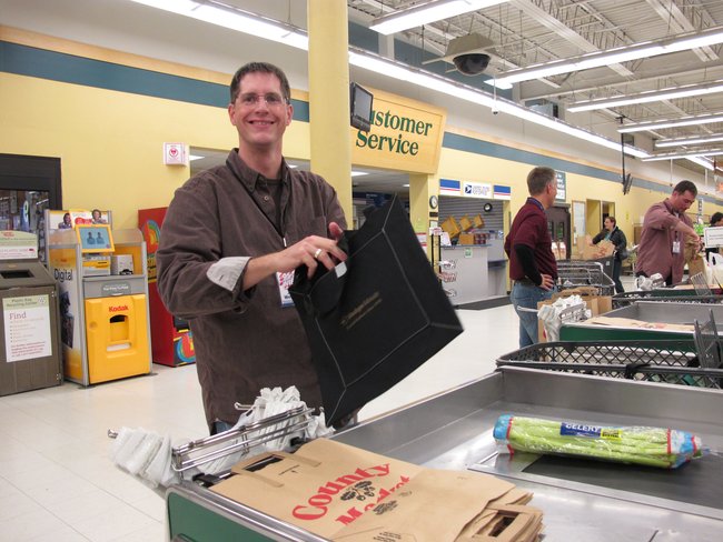 Joel..one of our big time marketing reps baggin' groceries..Go Joel!