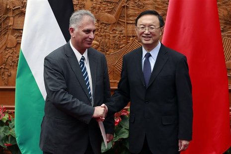 Chinese Foreign Minister Yang Jiechi (R) shakes hands with Bassam Al-Salhi, envoy of Palestinian President Mahmoud Abbas, at China's foreign Chinese Foreign Minister Yang Jiechi (R) shakes hands with Bassam Al-Salhi, envoy of Palestinian President Mahmoud Abbas, at China's foreign