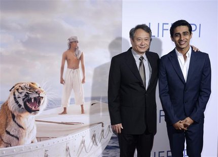 Director Ang Lee (L) and actor Suraj Sharma (R) attend a special screening of the film "The Life of Pi" in Los Angeles November 16, 2012. RE Director Ang Lee (L) and actor Suraj Sharma (R) attend a special screening of the film "The Life of Pi" in Los Angeles November 16, 2012. RE