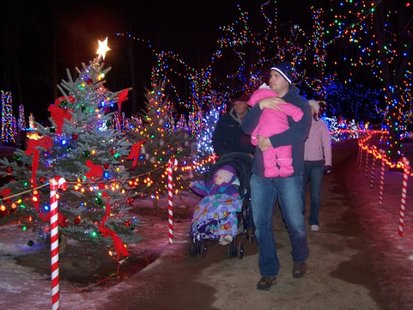 People strolling through the Rotary Winter Wonderland in Marshfield People strolling through the Rotary Winter Wonderland in Marshfield