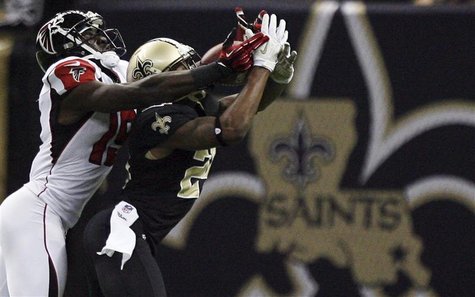 New Orleans Saints cornerback Corey White (24) intercepts a pass away from Atlanta Falcons wide receiver Drew Davis (19) during the second h New Orleans Saints cornerback Corey White (24) intercepts a pass away from Atlanta Falcons wide receiver Drew Davis (19) during the second h