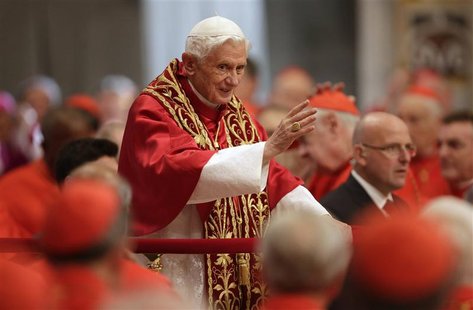 Pope Benedict XVI waves as he arrives to attend a consistory mass in St Peter's Basilica at the Vatican November 24, 2012. REUTERS/Tony Gent Pope Benedict XVI waves as he arrives to attend a consistory mass in St Peter's Basilica at the Vatican November 24, 2012. REUTERS/Tony Gent