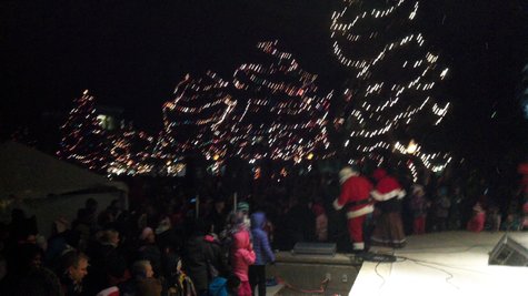 Santa and Mrs. Claus beat a hasty retreat for their tent so they can begin getting requests from children Santa and Mrs. Claus beat a hasty retreat for their tent so they can begin getting requests from children