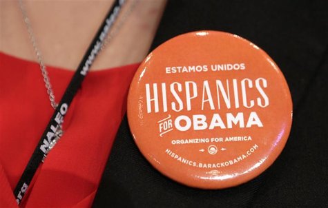 A woman wears a pin which says "Hispanics for Obama" before U.S. President Barack Obama spoke at the National Association of Latino Elected A woman wears a pin which says "Hispanics for Obama" before U.S. President Barack Obama spoke at the National Association of Latino Elected