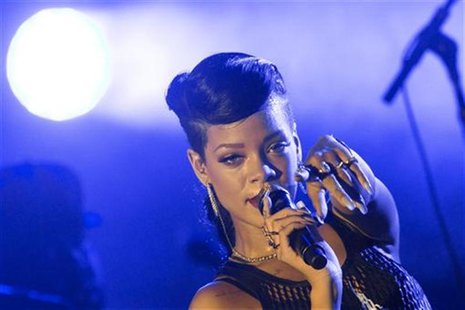Singer Rihanna performs during a concert as part of her 777 tour in Berlin, November 18, 2012. REUTERS/Thomas Peter Singer Rihanna performs during a concert as part of her 777 tour in Berlin, November 18, 2012. REUTERS/Thomas Peter