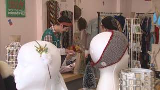 A shopper picks up holiday gifts at Dainty Daisies in Appleton on Small Business Saturday, November 24, 2012. (courtesy of FOX 11) A shopper picks up holiday gifts at Dainty Daisies in Appleton on Small Business Saturday, November 24, 2012. (courtesy of FOX 11)
