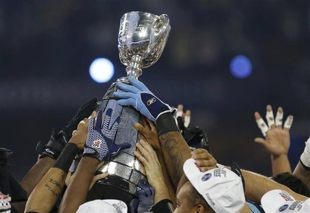 The Grey Cup is hoisted by the Toronto Argonauts after they defeated the Calgary Stampeders in the 100th CFL Grey Cup championship football The Grey Cup is hoisted by the Toronto Argonauts after they defeated the Calgary Stampeders in the 100th CFL Grey Cup championship football
