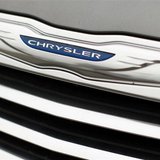 A Chrysler badge is pictured on a new car at a dealership in Vienna, Virginia April 26, 2012. REUTERS/Kevin Lamarque