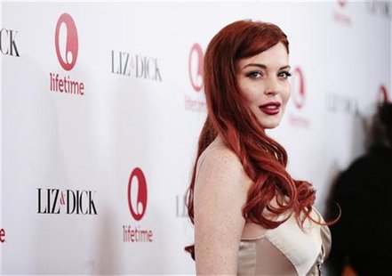 Actress Lindsay Lohan arrives for a private dinner celebrating the upcoming premiere of "Liz & Dick" at the Beverly Hills Hotel in Beverly H Actress Lindsay Lohan arrives for a private dinner celebrating the upcoming premiere of "Liz & Dick" at the Beverly Hills Hotel in Beverly H