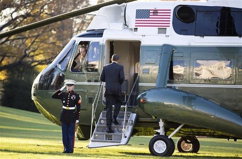 U.S. President Barack Obama boards Marine One before departing for a trip to Thailand, Burma and Cambodia from the White House in Washington U.S. President Barack Obama boards Marine One before departing for a trip to Thailand, Burma and Cambodia from the White House in Washington