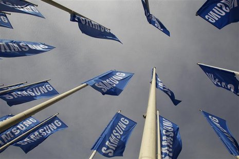 Samsung flags are set up at the main entrance to the Berlin fair ground before the IFA consumer electronics fair in Berlin, August 28, 2012. Samsung flags are set up at the main entrance to the Berlin fair ground before the IFA consumer electronics fair in Berlin, August 28, 2012.