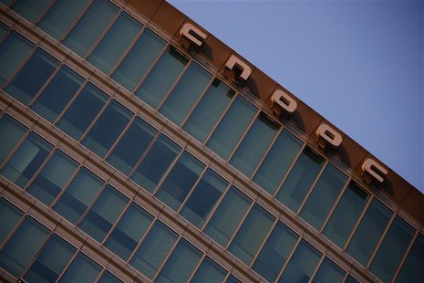 A logo of China National Offshore Oil Corp (CNOOC) is seen at the top of its headquarters in Beijing November 14, 2012. REUTERS/Petar Kujund A logo of China National Offshore Oil Corp (CNOOC) is seen at the top of its headquarters in Beijing November 14, 2012. REUTERS/Petar Kujund