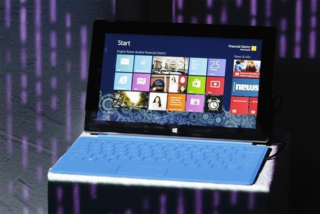 A Microsoft Surface tablet PC is displayed on a stand during its launch event with Microsoft Windows 8 in New York October 25, 2012. REUTERS A Microsoft Surface tablet PC is displayed on a stand during its launch event with Microsoft Windows 8 in New York October 25, 2012. REUTERS