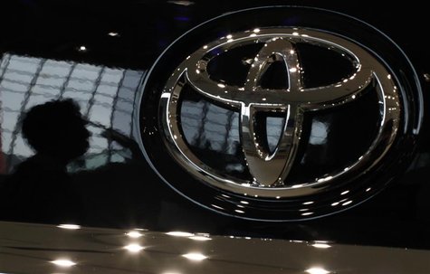 A visitor is reflected on a Toyota car at the company's showroom in Tokyo October 18, 2012. REUTERS/Toru Hanai A visitor is reflected on a Toyota car at the company's showroom in Tokyo October 18, 2012. REUTERS/Toru Hanai