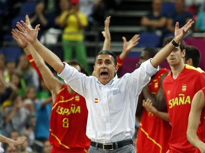 Spain's head coach Sergio Scariolo reacts during game against France at their men's quarterfinal basketball match at the North Greenwich Are Spain's head coach Sergio Scariolo reacts during game against France at their men's quarterfinal basketball match at the North Greenwich Are
