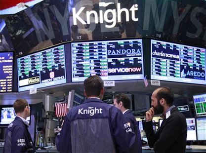 Traders work at the Knight Capital kiosk on the floor of the New York Stock Exchange August 3, 2012. REUTERS/Brendan McDermid Traders work at the Knight Capital kiosk on the floor of the New York Stock Exchange August 3, 2012. REUTERS/Brendan McDermid