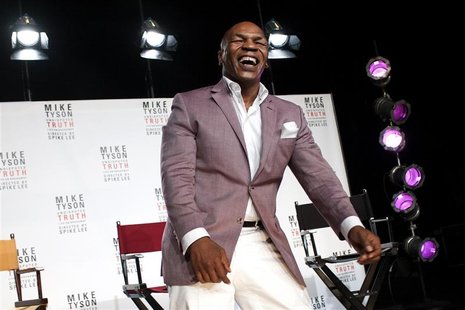 Former heavyweight champion Mike Tyson laughs as he talks about the Broadway debut of his one-man show "Mike Tyson: Undisputed Truth" during Former heavyweight champion Mike Tyson laughs as he talks about the Broadway debut of his one-man show "Mike Tyson: Undisputed Truth" during