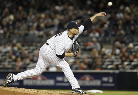 New York Yankees starter Andy Pettitte pitches to the Detroit Tigers during the second inning in Game 1 of their MLB ALCS playoff baseball s New York Yankees starter Andy Pettitte pitches to the Detroit Tigers during the second inning in Game 1 of their MLB ALCS playoff baseball s