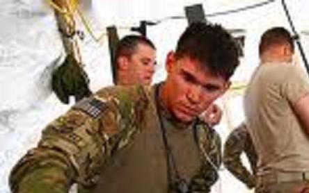 Specialist Zachary Shanafelt on the job at a MASH in Afghanistan. Specialist Zachary Shanafelt on the job at a MASH in Afghanistan.