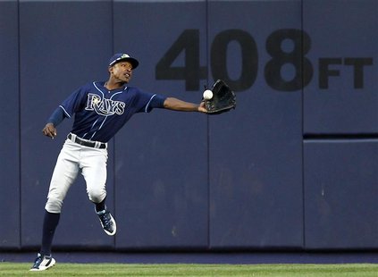 Tampa Bay Rays center fielder B.J. Upton fails to make a catch on an RBI single by New York Yankees Alex Rodriguez during the eighth inning Tampa Bay Rays center fielder B.J. Upton fails to make a catch on an RBI single by New York Yankees Alex Rodriguez during the eighth inning