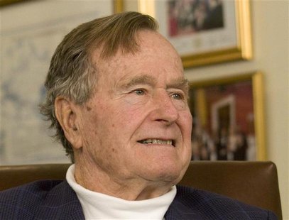 Former President George H.W. Bush smiles as he listens to Republican presidential candidate Mitt Romney speak as he met with Bush to pick up Former President George H.W. Bush smiles as he listens to Republican presidential candidate Mitt Romney speak as he met with Bush to pick up