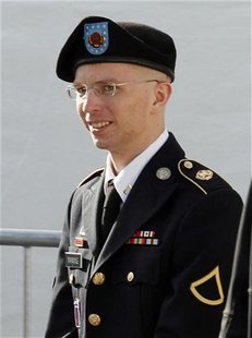 Army Private First Class Bradley Manning is escorted in handcuffs as he leaves the courthouse in Fort Meade, Maryland June 6, 2012. REUTERS/ Army Private First Class Bradley Manning is escorted in handcuffs as he leaves the courthouse in Fort Meade, Maryland June 6, 2012. REUTERS/