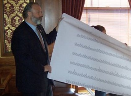 Scot Ross with One Wisconsin Now presents a same-day voter registration petition in Madison, WI (Photo: Wisconsin Radio Network) Scot Ross with One Wisconsin Now presents a same-day voter registration petition in Madison, WI (Photo: Wisconsin Radio Network)