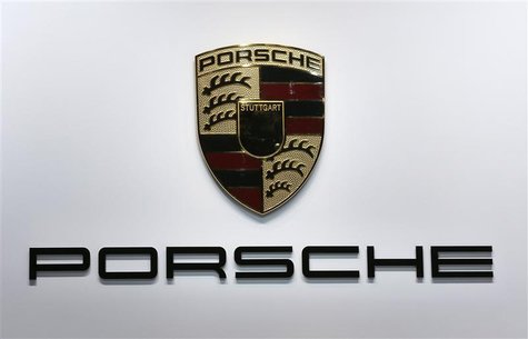 A logo is seen on the Porsche booth on media day at the Paris Mondial de l'Automobile September 27, 2012. REUTERS/Jacky Naegelen A logo is seen on the Porsche booth on media day at the Paris Mondial de l'Automobile September 27, 2012. REUTERS/Jacky Naegelen
