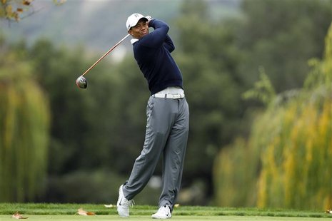 Tiger Woods of the U.S. tees off on the fifth hole during the first round of the World Challenge golf tournament in Thousand Oaks, Californi Tiger Woods of the U.S. tees off on the fifth hole during the first round of the World Challenge golf tournament in Thousand Oaks, Californi