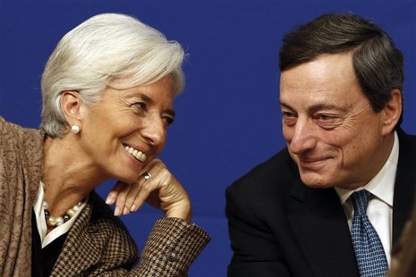 International Monetary Fund (IMF) Managing Director Christine Lagarde (L) and European Central Bank (ECB) President Mario Draghi attend the International Monetary Fund (IMF) Managing Director Christine Lagarde (L) and European Central Bank (ECB) President Mario Draghi attend the