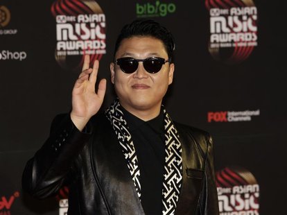 South Korean pop singer Psy poses on the red carpet as he attends the Mnet Asian Music Awards (MAMA) in Hong Kong November 30, 2012. REUTERS South Korean pop singer Psy poses on the red carpet as he attends the Mnet Asian Music Awards (MAMA) in Hong Kong November 30, 2012. REUTERS