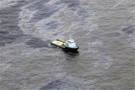 An aerial view is seen of oil that seeped off the coast of Rio de Janeiro, caused by a well drilled by Chevron at Frade, on the water in Cam An aerial view is seen of oil that seeped off the coast of Rio de Janeiro, caused by a well drilled by Chevron at Frade, on the water in Cam
