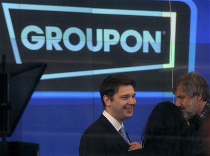 Groupon Chief Executive Andrew Mason (L) prepares for the opening bell ceremony celebrating his company's IPO at the Nasdaq Market in New Yo Groupon Chief Executive Andrew Mason (L) prepares for the opening bell ceremony celebrating his company's IPO at the Nasdaq Market in New Yo
