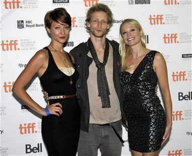 (L-R) Cast members Gretchen Lodge, Johnny Lewis and Alexandra Holden pose at the screening of the film "Lovely Molly" at the 36th Toronto In (L-R) Cast members Gretchen Lodge, Johnny Lewis and Alexandra Holden pose at the screening of the film "Lovely Molly" at the 36th Toronto In