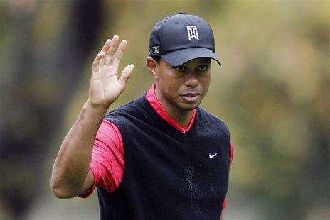 Tiger Woods waves after making a birdie on the 16th hole during the final round of the World Challenge golf tournament in Thousand Oaks, Cal Tiger Woods waves after making a birdie on the 16th hole during the final round of the World Challenge golf tournament in Thousand Oaks, Cal