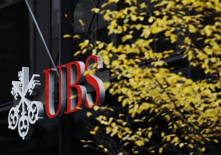 Signs are seen on the outside of Swiss bank UBS in central London November 20, 2012. REUTERS/Luke MacGregor Signs are seen on the outside of Swiss bank UBS in central London November 20, 2012. REUTERS/Luke MacGregor