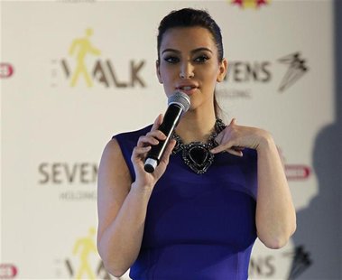 U.S. television celebrity Kim Kardashian performs during a promotional visit to a newly built shopping mall in Riffa, south of Manama Decemb U.S. television celebrity Kim Kardashian performs during a promotional visit to a newly built shopping mall in Riffa, south of Manama Decemb