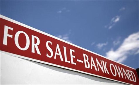 A bank-owned property for sale sign in Arvada, Colorado June 23, 2009. REUTERS/Rick Wilking A bank-owned property for sale sign in Arvada, Colorado June 23, 2009. REUTERS/Rick Wilking