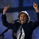 Former Beatle Paul McCartney sings during the opening ceremony of the London 2012 Olympic Games at the Olympic Stadium July 27, 2012. REUTER Former Beatle Paul McCartney sings during the opening ceremony of the London 2012 Olympic Games at the Olympic Stadium July 27, 2012. REUTER