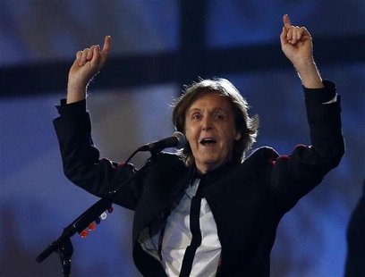 Former Beatle Paul McCartney sings during the opening ceremony of the London 2012 Olympic Games at the Olympic Stadium July 27, 2012. REUTER Former Beatle Paul McCartney sings during the opening ceremony of the London 2012 Olympic Games at the Olympic Stadium July 27, 2012. REUTER