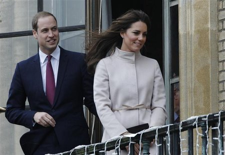Britain's Prince William (L) and Catherine, Duchess of Cambridge wave while visiting the Guildhall in Cambridge, central England November 28 Britain's Prince William (L) and Catherine, Duchess of Cambridge wave while visiting the Guildhall in Cambridge, central England November 28