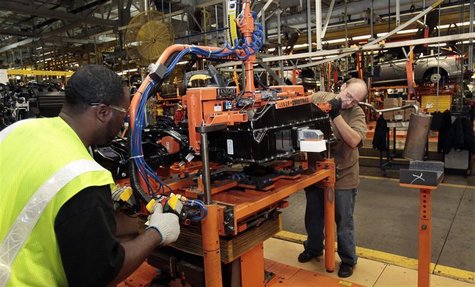 Ford Assembly workers install a battery onto the chassis of a Ford Focus Electric vehicle at the Michigan Assembly Plant in Wayne, Michigan Ford Assembly workers install a battery onto the chassis of a Ford Focus Electric vehicle at the Michigan Assembly Plant in Wayne, Michigan