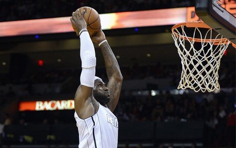 Miami Heat's LeBron James goes to the basket against the Cleveland Cavaliers during the first half of their NBA basketball game in Miami, Fl Miami Heat's LeBron James goes to the basket against the Cleveland Cavaliers during the first half of their NBA basketball game in Miami, Fl