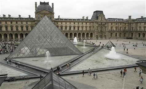 General view of the Louvre Museum with its glass Pyramid entrance designed by Chinese-born U.S. Architect I.M. Pei, in Paris, August 6, 2007 General view of the Louvre Museum with its glass Pyramid entrance designed by Chinese-born U.S. Architect I.M. Pei, in Paris, August 6, 2007